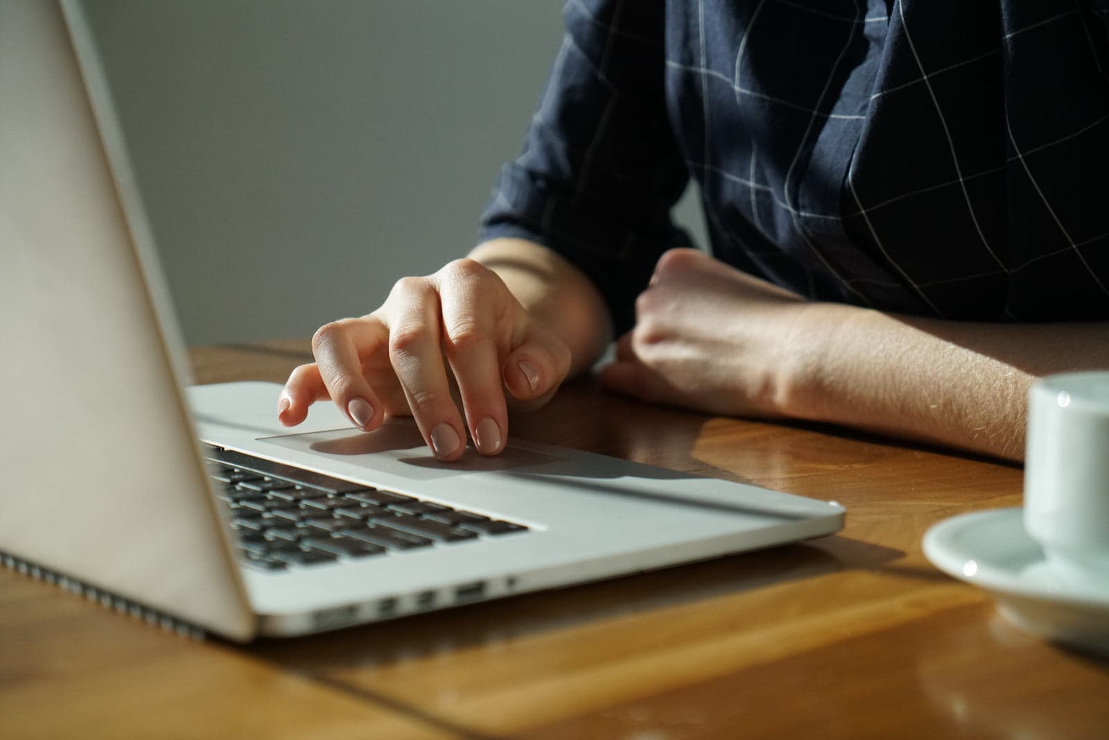 person building a website in a laptop browser