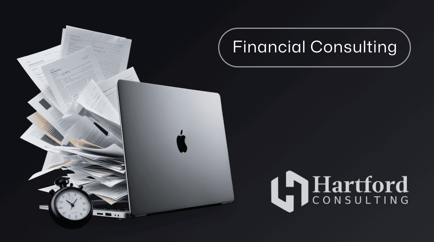 Laptop with a pile of paper documents and a stopwatch next to the Hartford Consulting logo